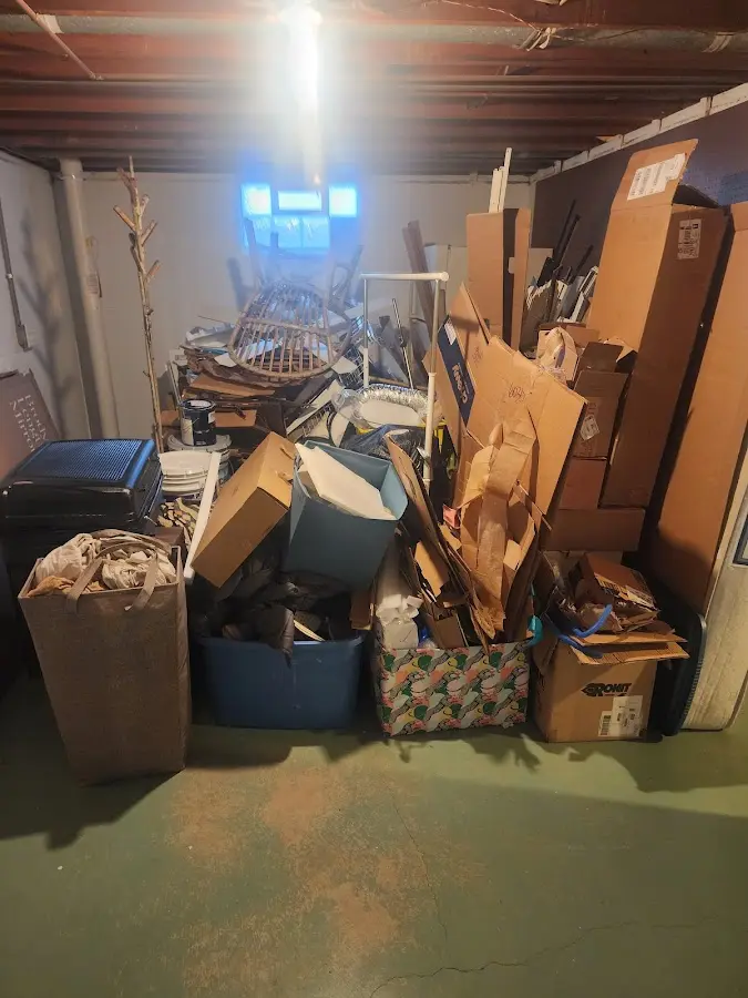 Roll-off dumpster container at job site for 20 Yard Dumpster Rental in Deephaven